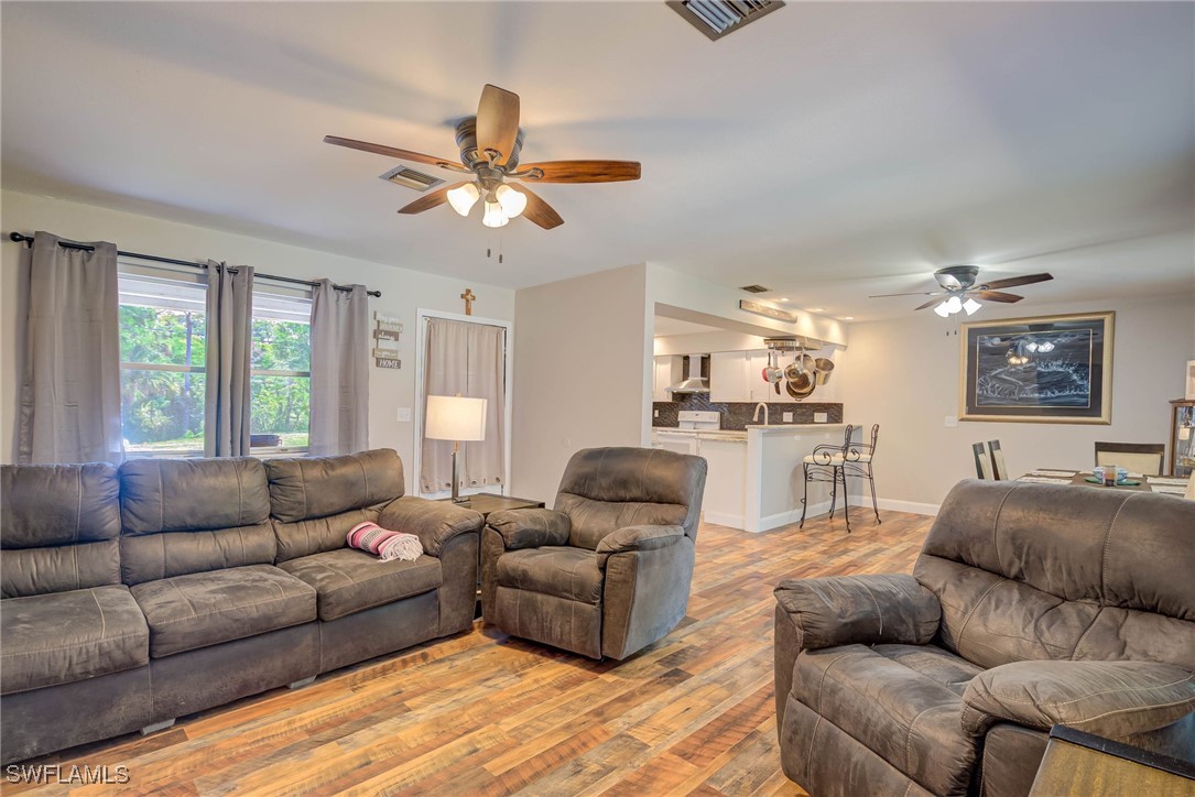 2970 Packinghouse Road Alva, FL 33920 - Photo 5 of 39 a living room with furniture and a large window