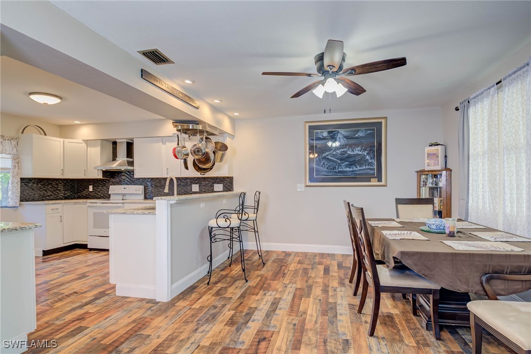 2970 Packinghouse Road Alva, FL 33920 - Photo 8 of 39 a kitchen with a table and chairs in it