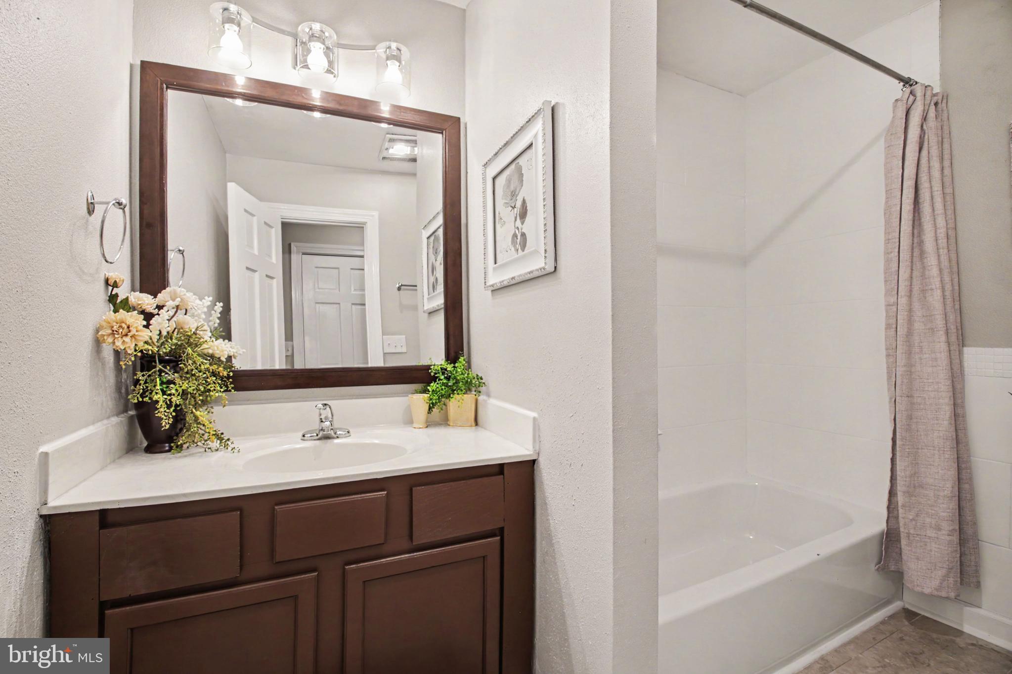 10224 Mill Pond Road Spotsylvania, VA 22551 - Photo 15 of 52 Main Level Bathroom w/Vanity w/Storage& Tub/Shower