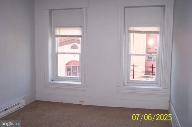 an empty room with a window