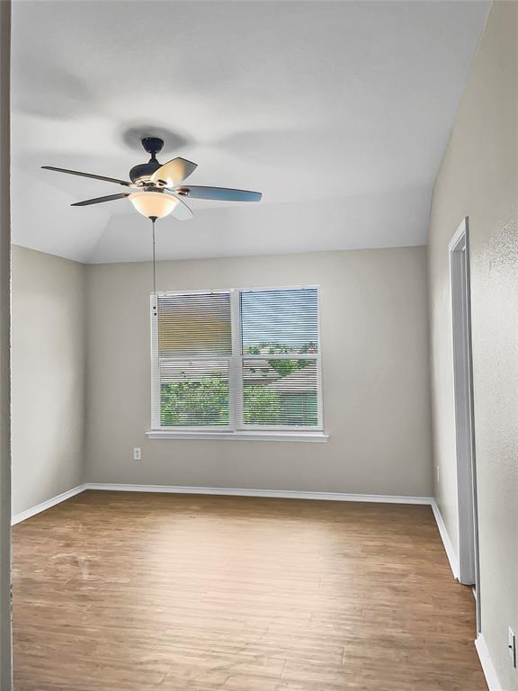 213 Long Prairie Drive Forney, TX 75126 - Photo 10 of 14 a view of an empty room with a window