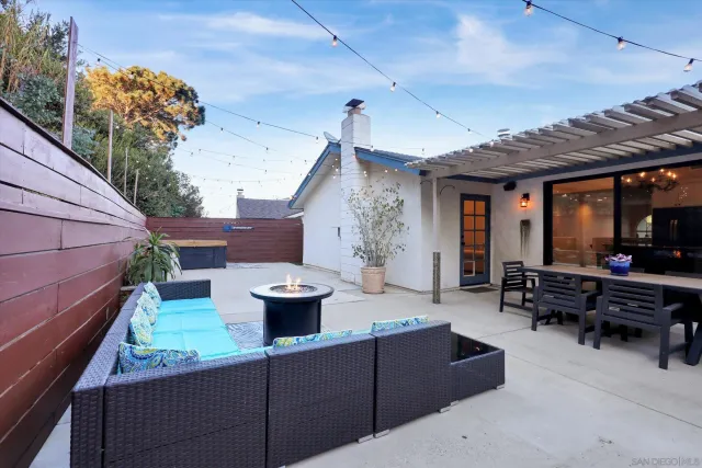 a view of a patio with open kitchen