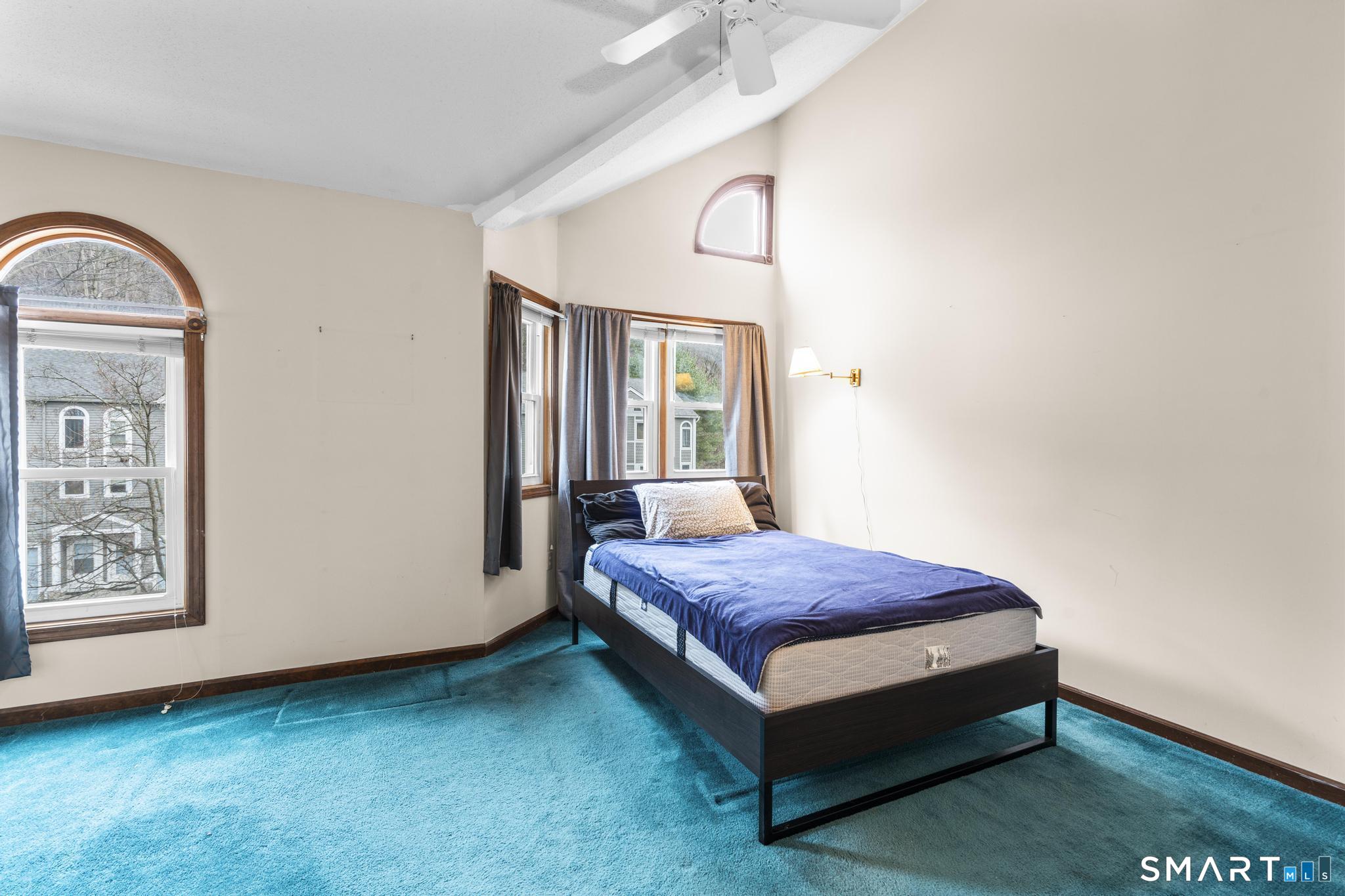 1655 North Colony Road, Unit 15 Meriden, CT 06450 - Photo 12 of 25 a bedroom with a bed and window