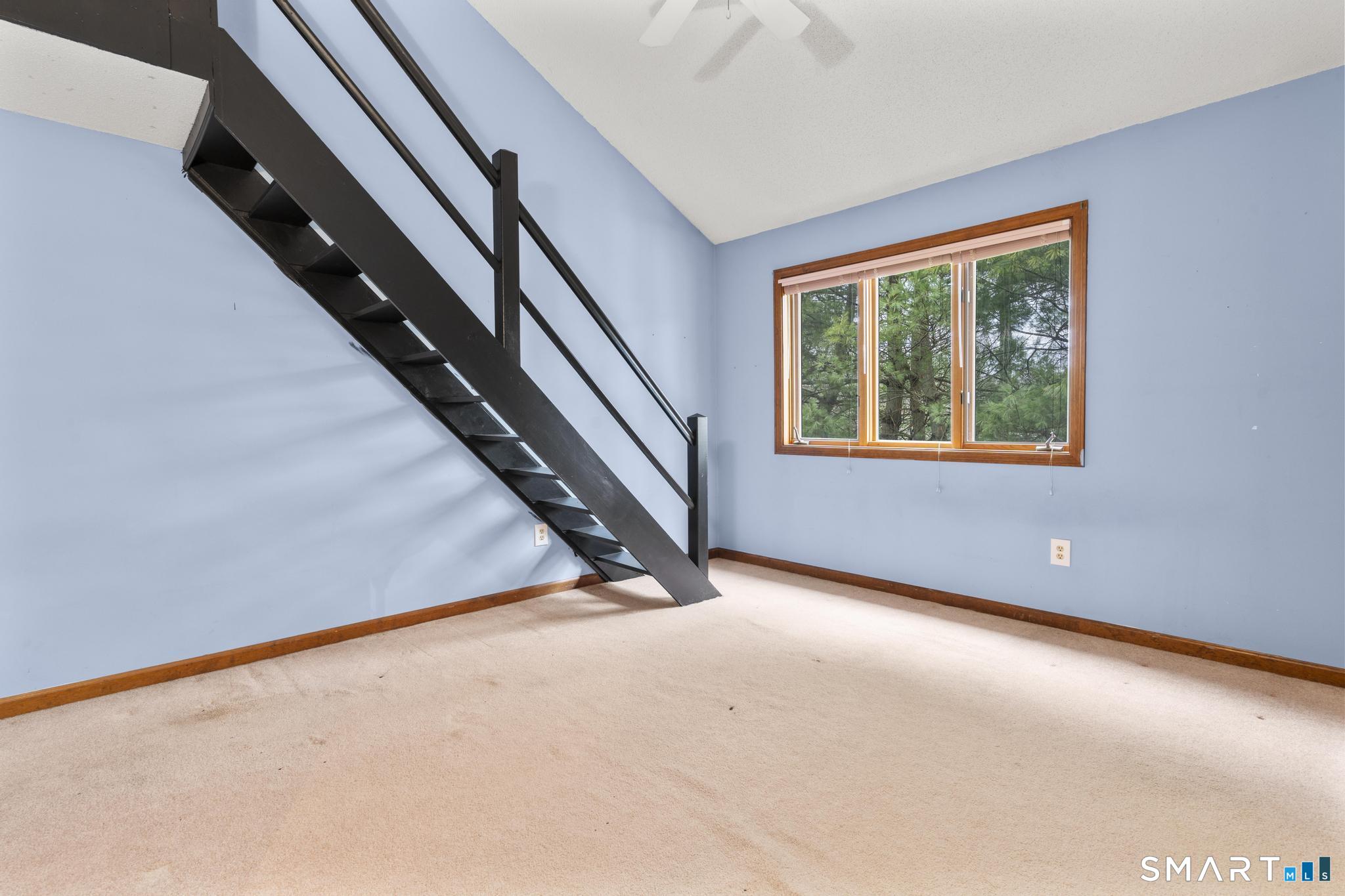 1655 North Colony Road, Unit 15 Meriden, CT 06450 - Photo 15 of 25 an empty room with windows
