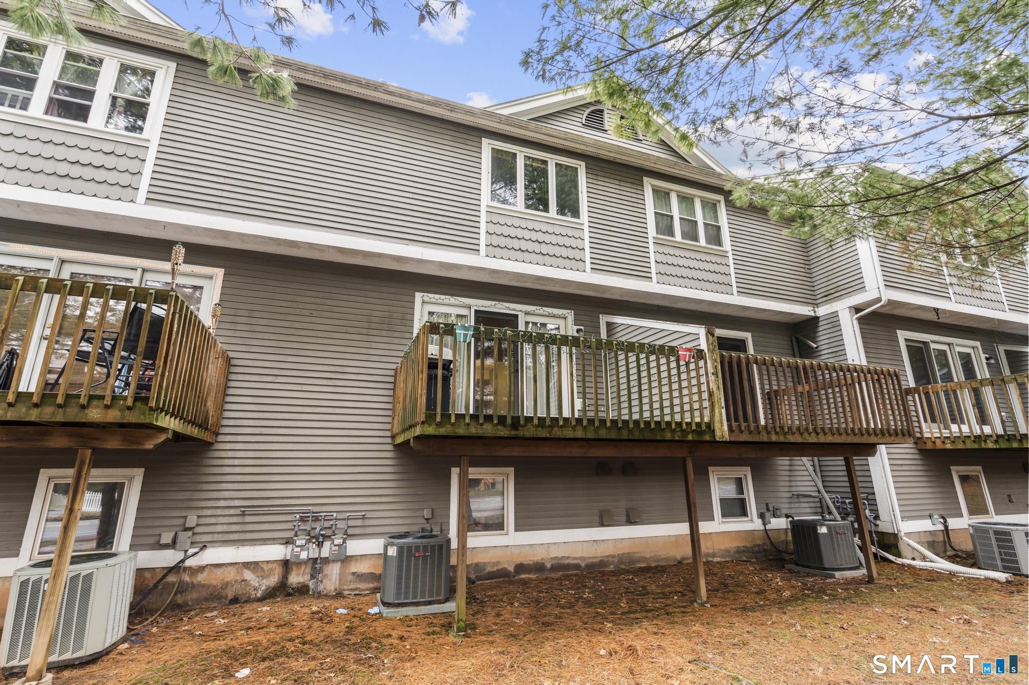 1655 North Colony Road, Unit 15 Meriden, CT 06450 - Photo 24 of 25 a front view of a house with balcony