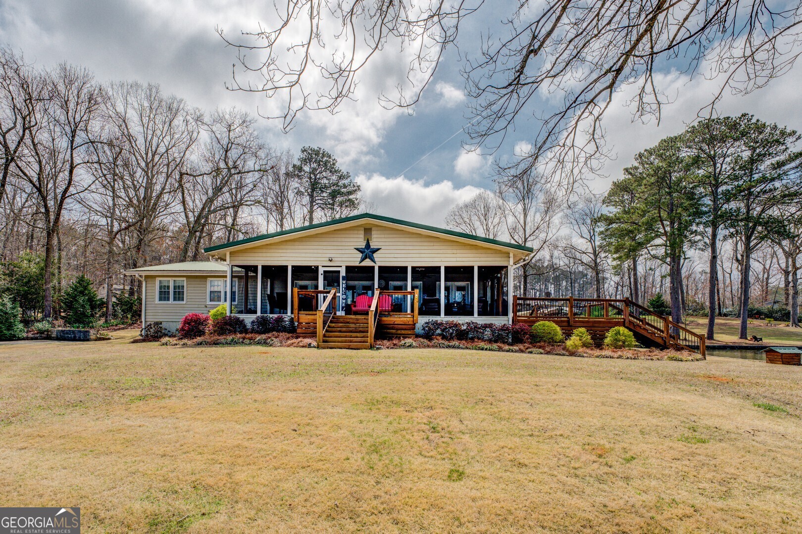 171 Blackberry Road Jackson, GA 30233 - Photo 12 of 78 a view of a parked cars in front of a building
