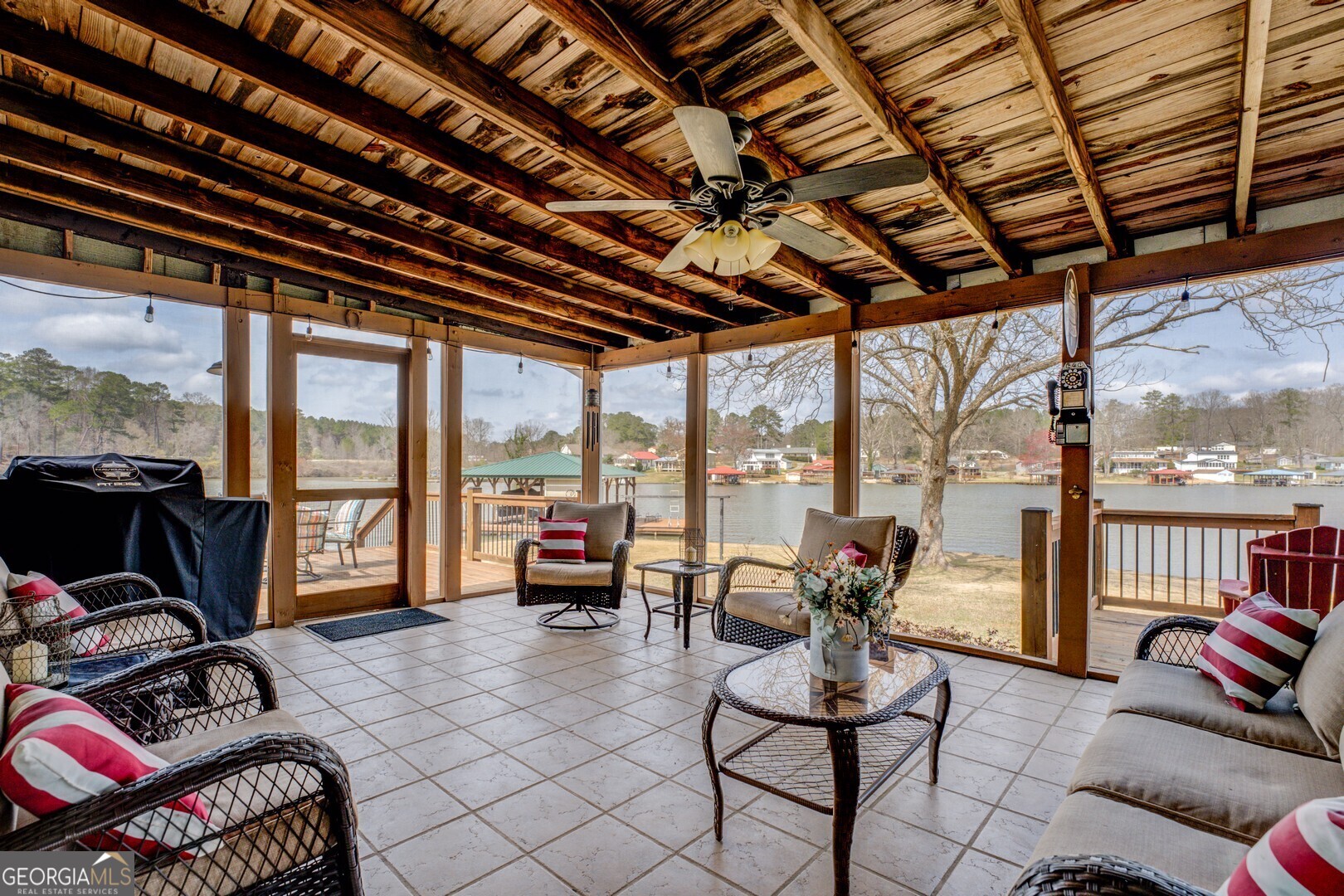 171 Blackberry Road Jackson, GA 30233 - Photo 17 of 78 a living room with furniture and floor to ceiling window