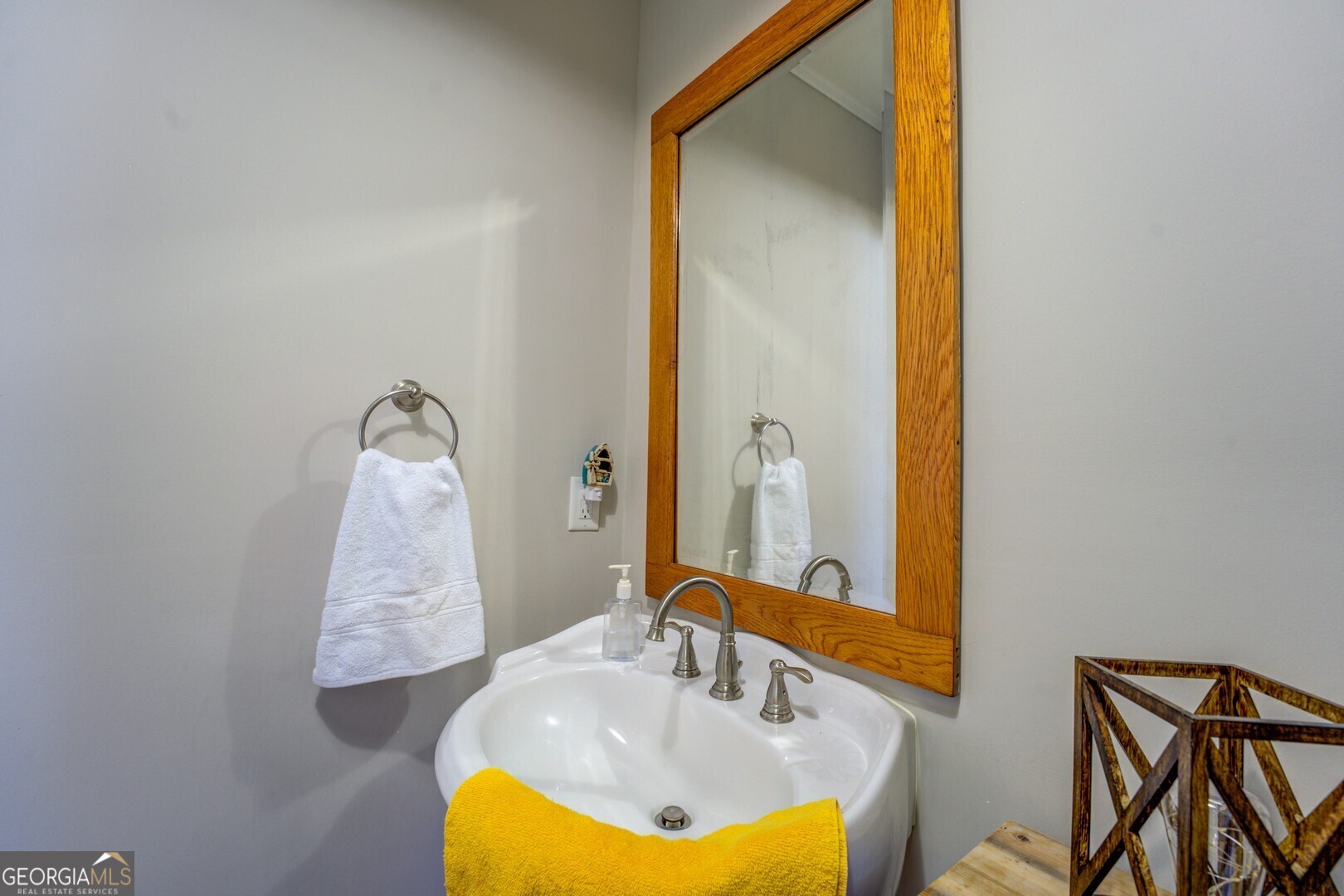171 Blackberry Road Jackson, GA 30233 - Photo 23 of 78 a bathroom with a sink and a mirror