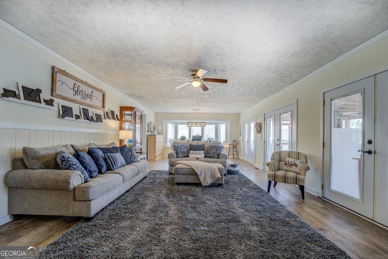 171 Blackberry Road Jackson, GA 30233 - Photo 33 of 78 a living room with furniture and a large window