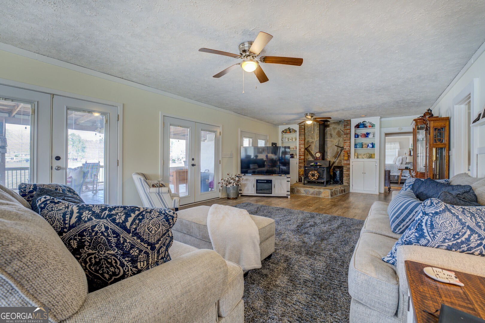 171 Blackberry Road Jackson, GA 30233 - Photo 35 of 78 a living room with furniture and a large window
