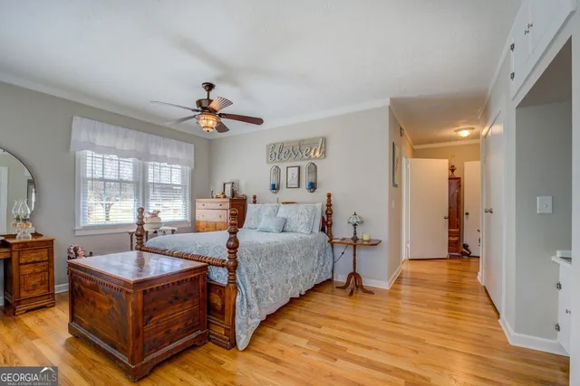 a view of balcony with wooden floor and fence