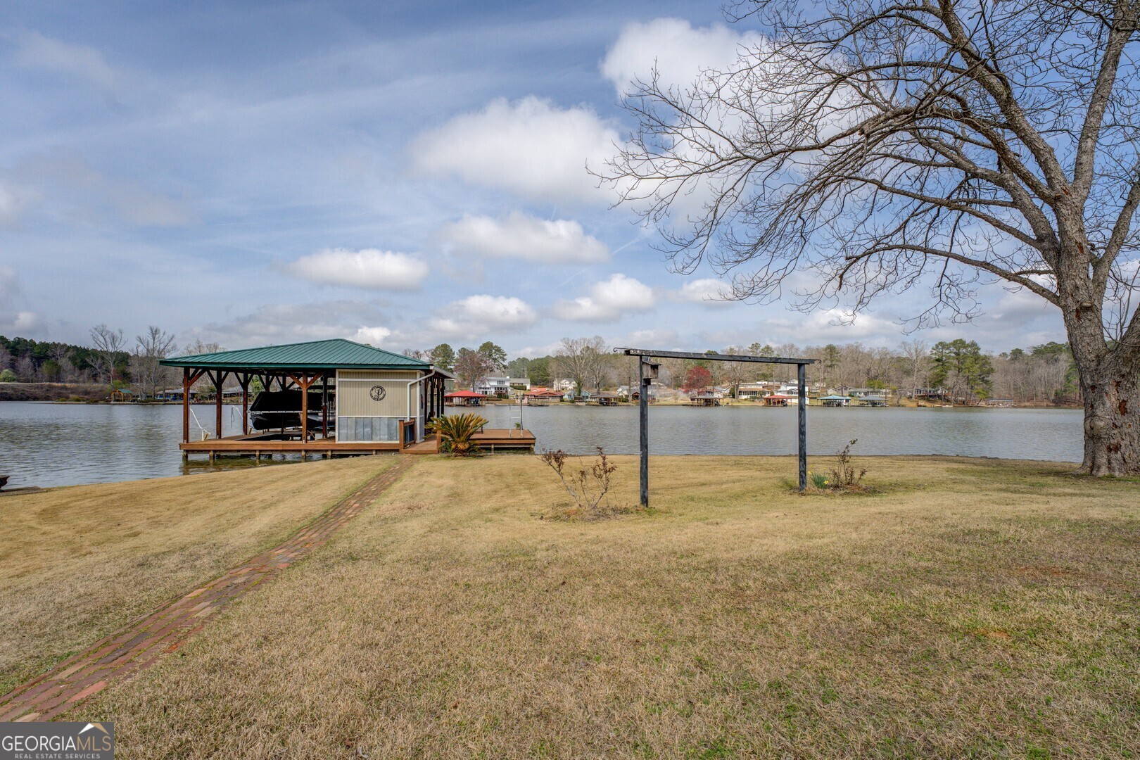 171 Blackberry Road Jackson, GA 30233 - Photo 4 of 78 a view of a house with a yard and covered with snow