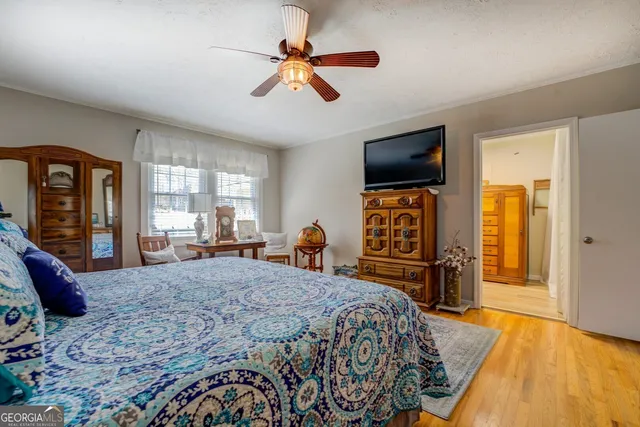 a view of a chairs and table in the patio