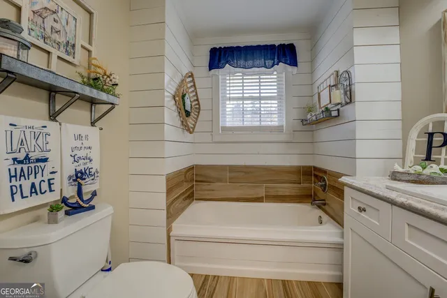 a view of a lake with a house