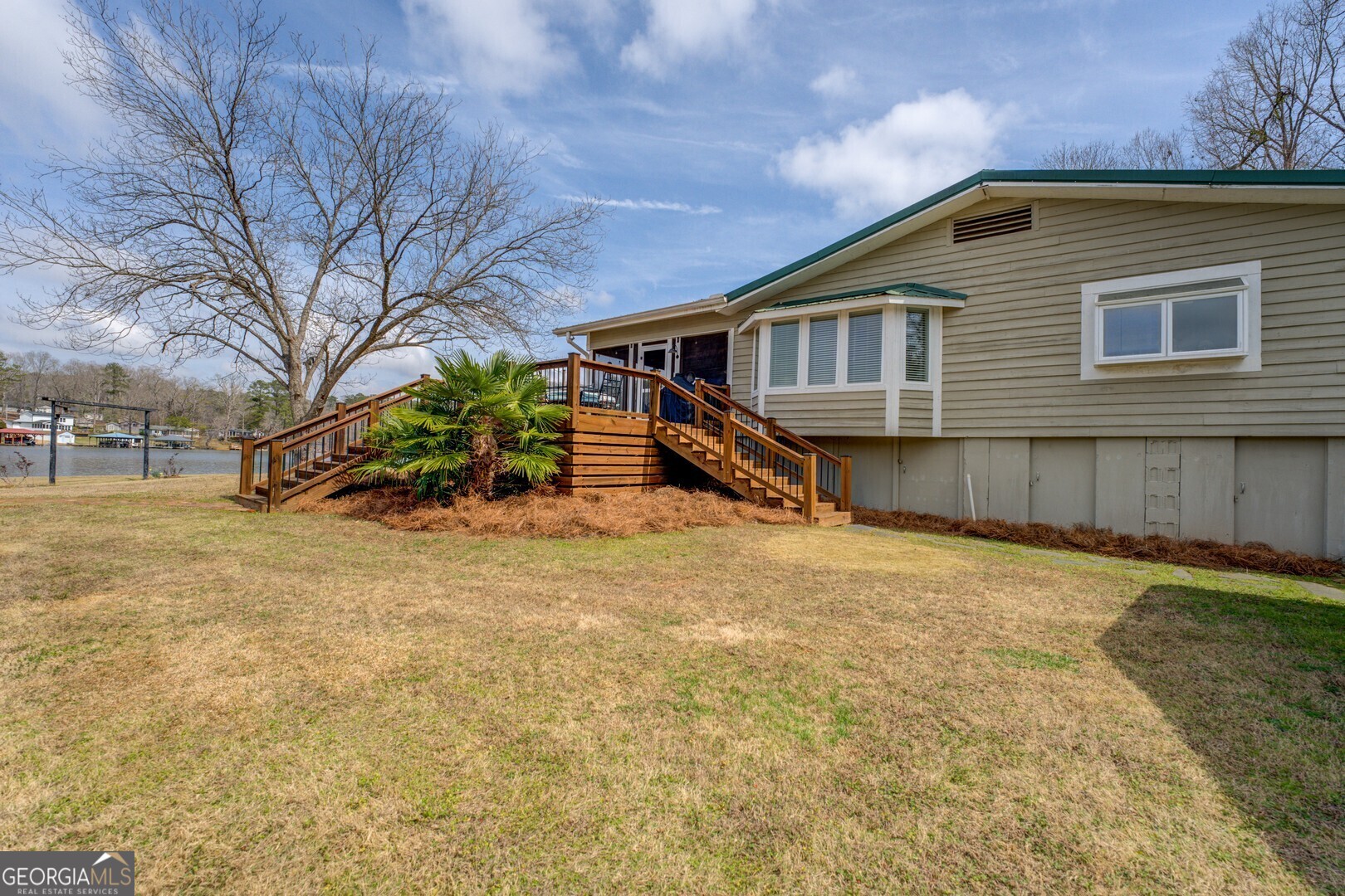 171 Blackberry Road Jackson, GA 30233 - Photo 69 of 78 a front view of a house with a yard