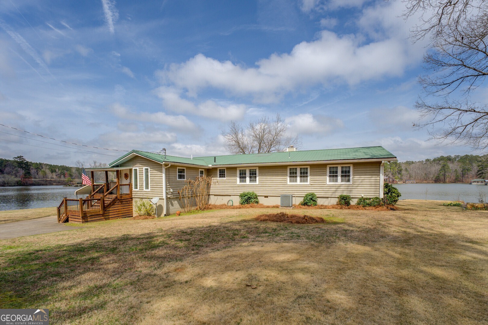 171 Blackberry Road Jackson, GA 30233 - Photo 70 of 78 a view of a house with a big yard and large trees