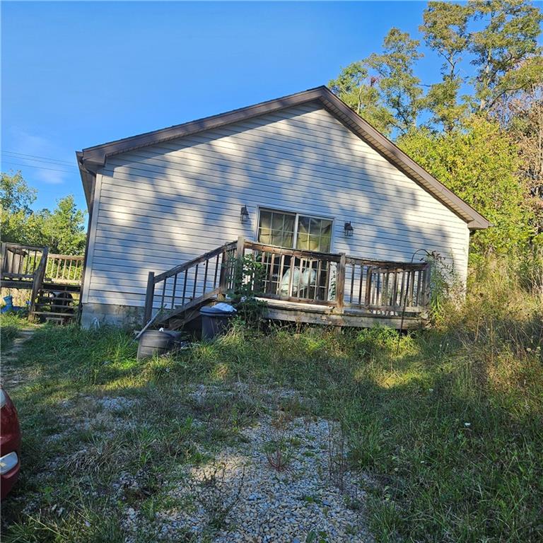 349 Vanderbilt Road Connellsville, PA 15425 - Photo 3 of 18 a view of a house with a yard