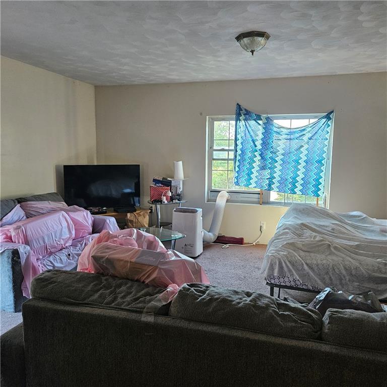 349 Vanderbilt Road Connellsville, PA 15425 - Photo 8 of 18 a bedroom with a bed and a window