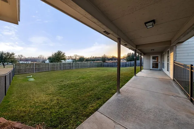 a view of a backyard with a garden