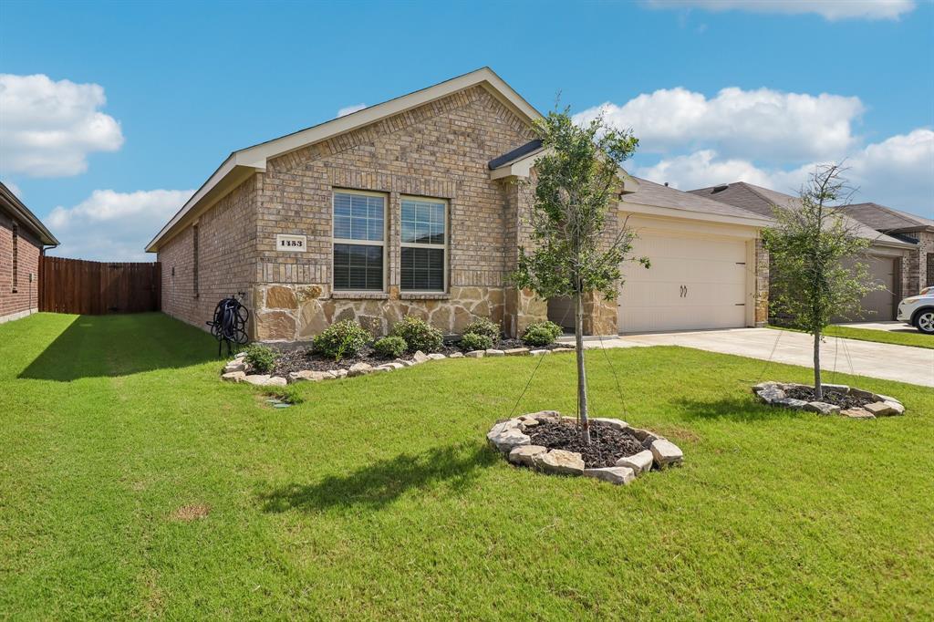 1453 Millstead Rill Road Caddo Mills, TX 75135 - Photo 2 of 40 Brick and stone facade residence featuring a two-car garage