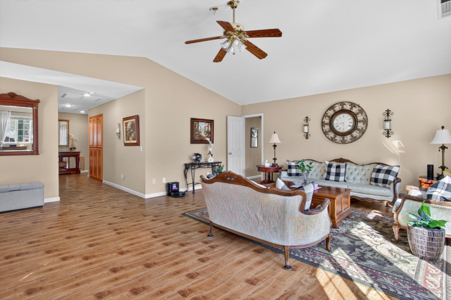 4856 Kiva Drive Copperopolis, CA 95228 - Photo 17 of 61 a living room with furniture and a large window