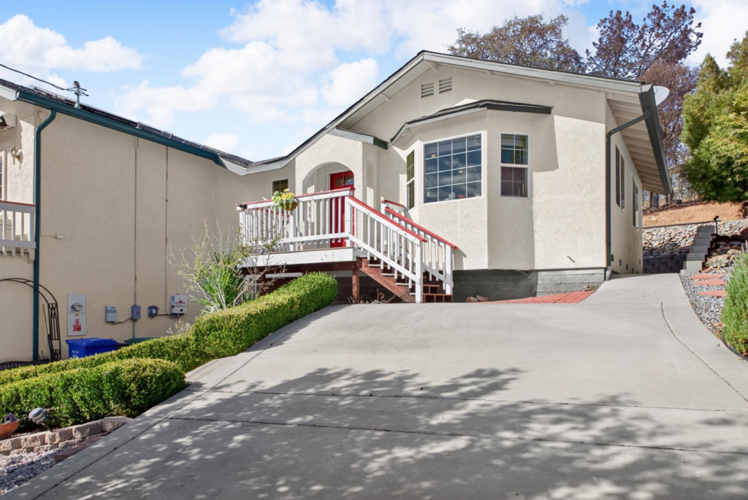 4856 Kiva Drive Copperopolis, CA 95228 - Photo 32 of 61 a front view of a house with a yard and garage