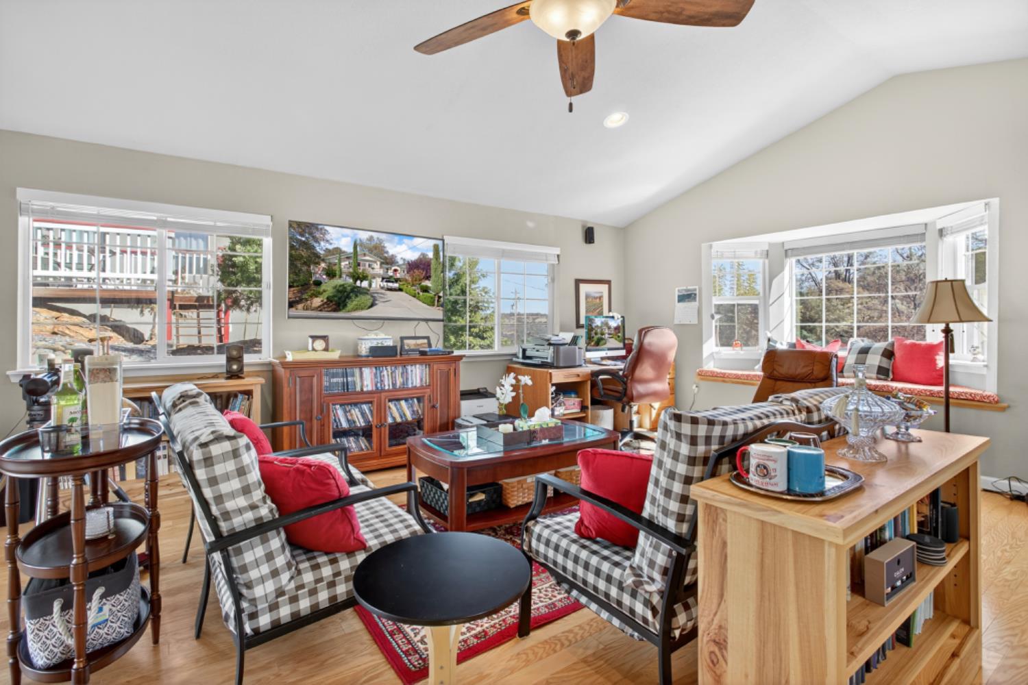 4856 Kiva Drive Copperopolis, CA 95228 - Photo 35 of 61 a living room with furniture kitchen view and a large window