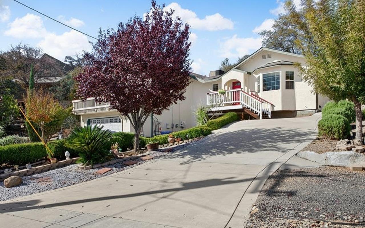 4856 Kiva Drive Copperopolis, CA 95228 - Photo 43 of 61 a front view of a house with a yard