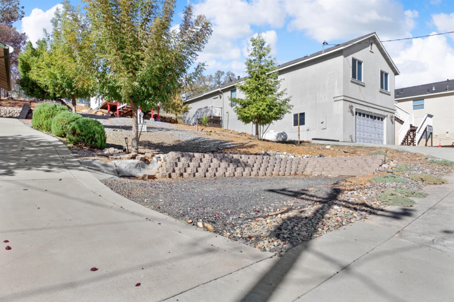 4856 Kiva Drive Copperopolis, CA 95228 - Photo 45 of 61 front view of a house with a street