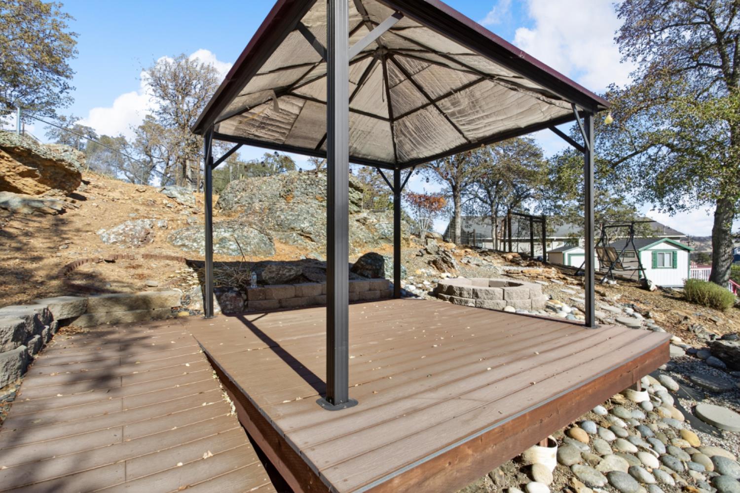 4856 Kiva Drive Copperopolis, CA 95228 - Photo 49 of 61 a view of a balcony with chairs and wooden floor