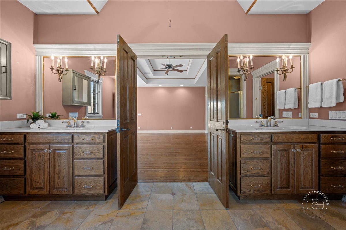 5N214 Wilton Croft Road St. Charles, IL 60175 - Photo 15 of 37 a bathroom with a sink and a mirror