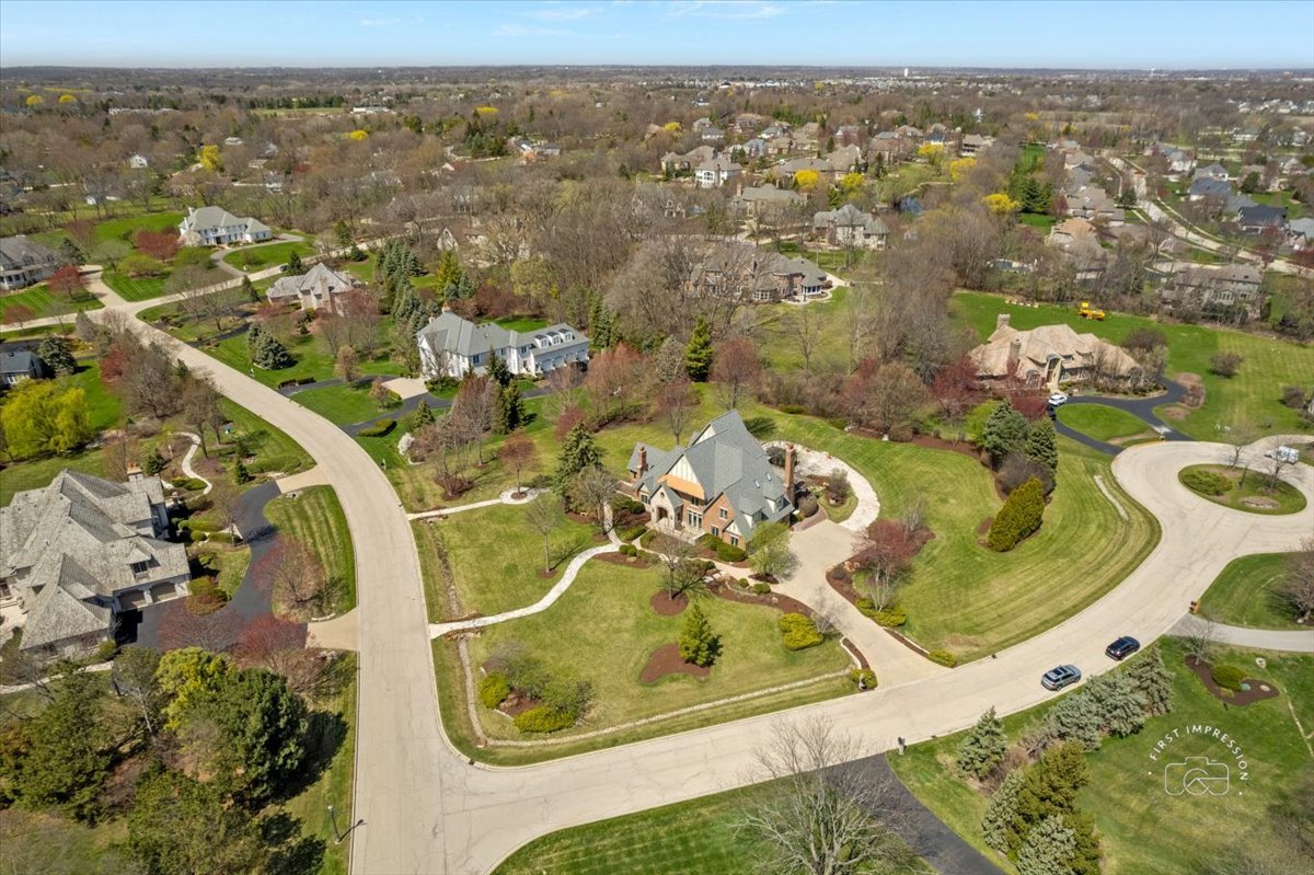 5N214 Wilton Croft Road St. Charles, IL 60175 - Photo 32 of 37 an aerial view of residential houses with outdoor space