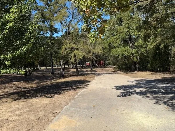 a view of road with trees