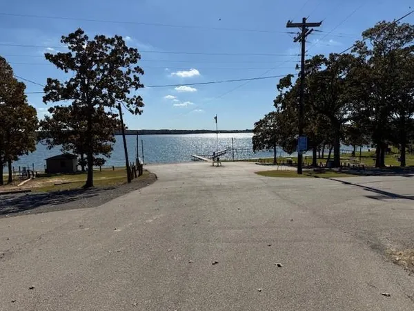 a kitchen with stainless steel appliances a refrigerator and a stove