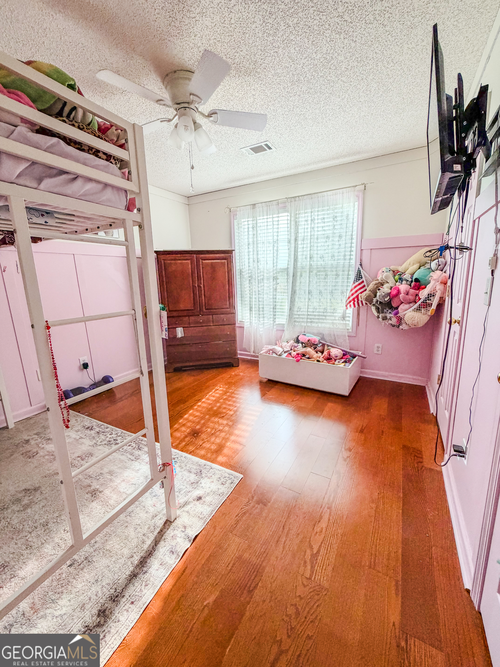 408 Mosby Lane Locust Grove, GA 30248 - Photo 13 of 17 a hallway with a couch and a large window