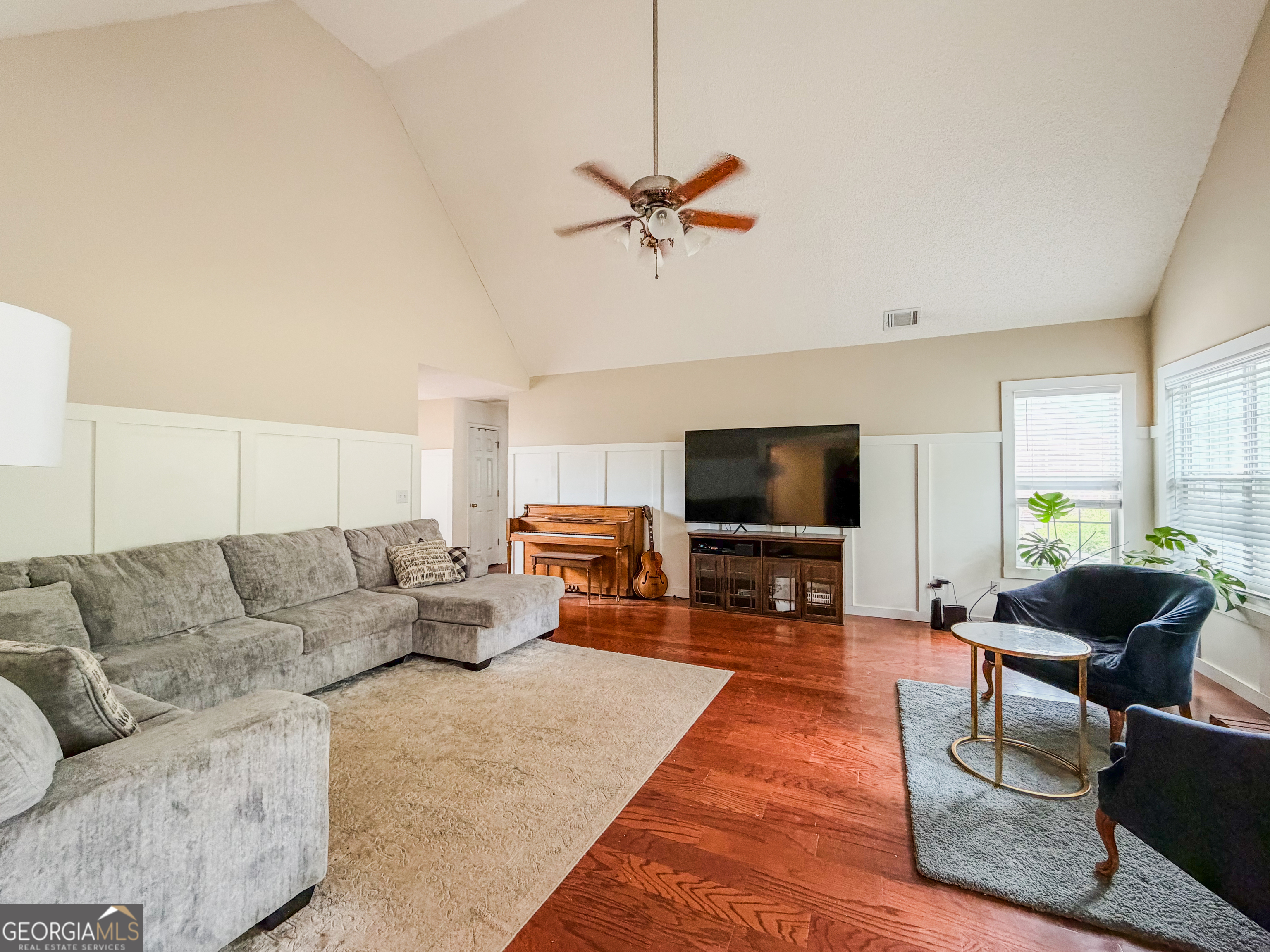 408 Mosby Lane Locust Grove, GA 30248 - Photo 5 of 17 a living room with furniture and a flat screen tv