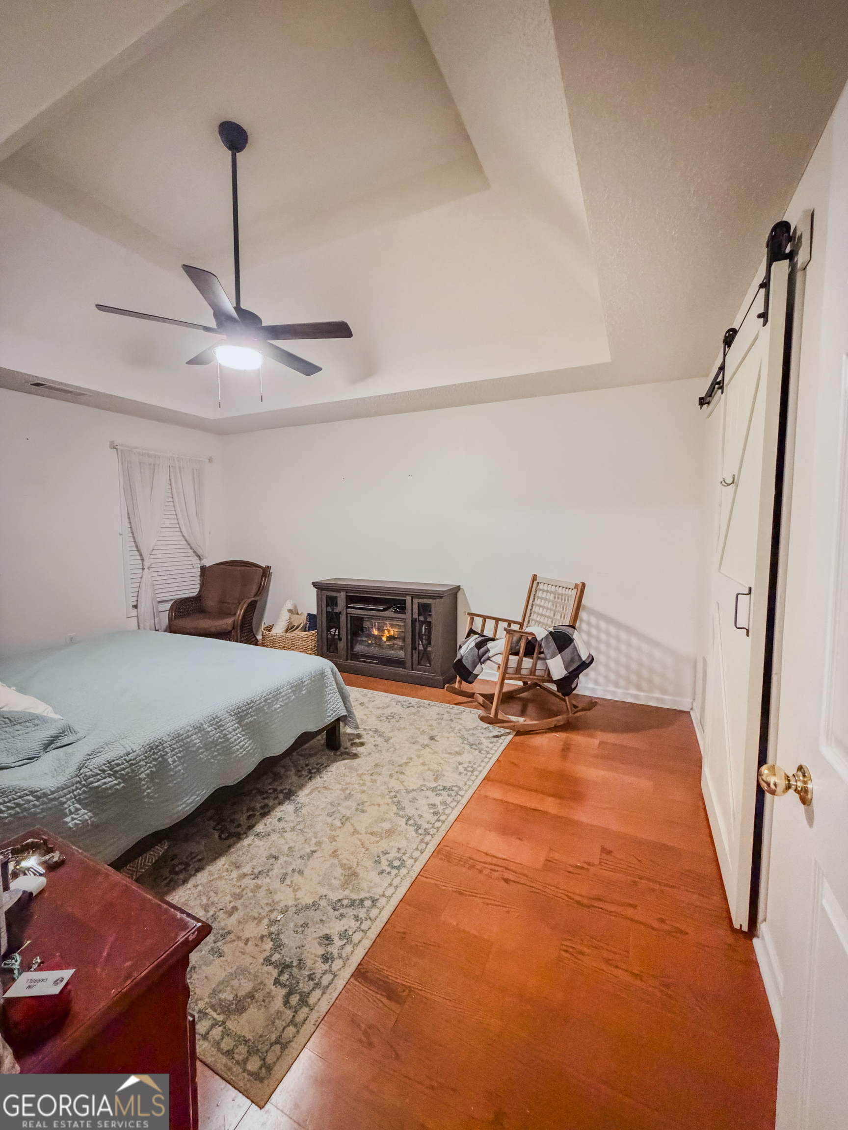 408 Mosby Lane Locust Grove, GA 30248 - Photo 9 of 17 a bed room with bed and window