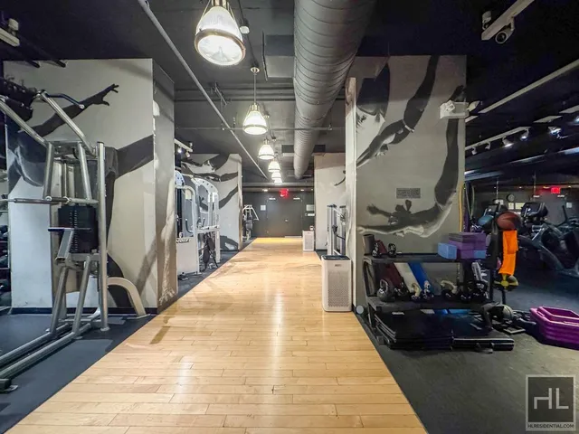 a view of room with gym equipment