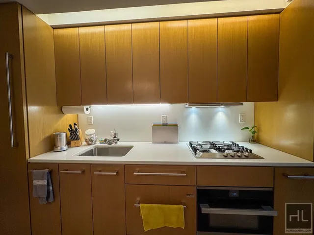 a very nice looking dining room with a large window