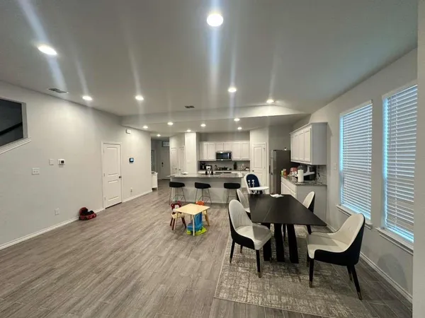 a view of a dining room with furniture