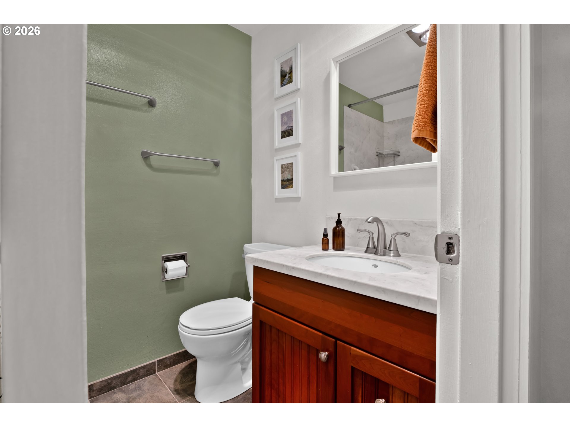 126 Treehill Loop Eugene, OR 97405 - Photo 18 of 35 a bathroom with a granite countertop sink a toilet and a mirror