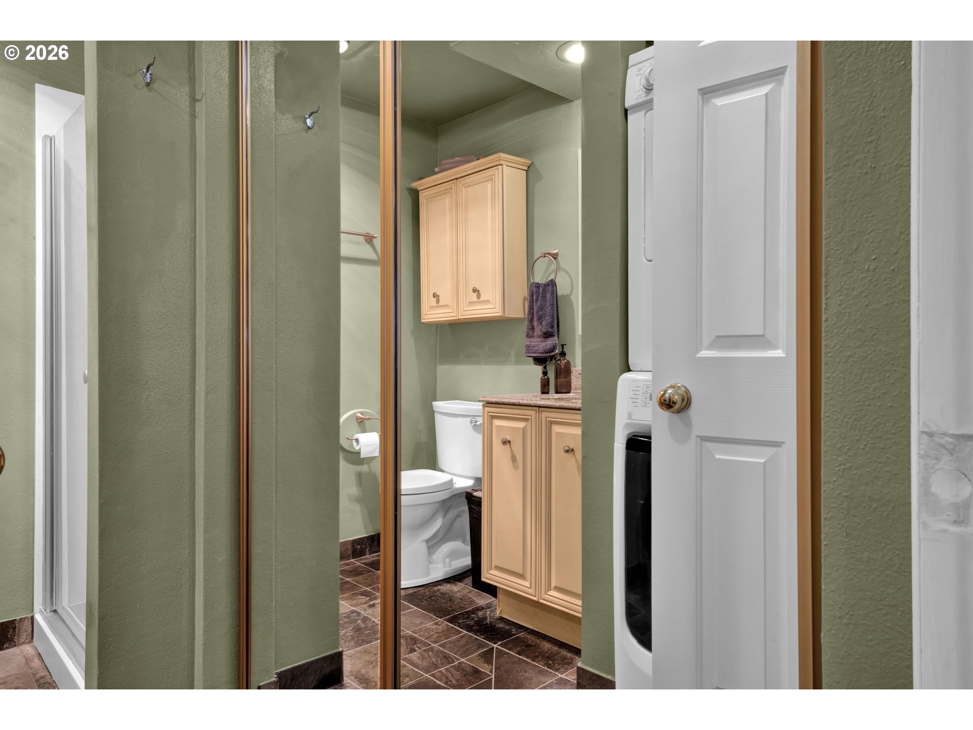 126 Treehill Loop Eugene, OR 97405 - Photo 23 of 35 a bathroom with a sink and a mirror