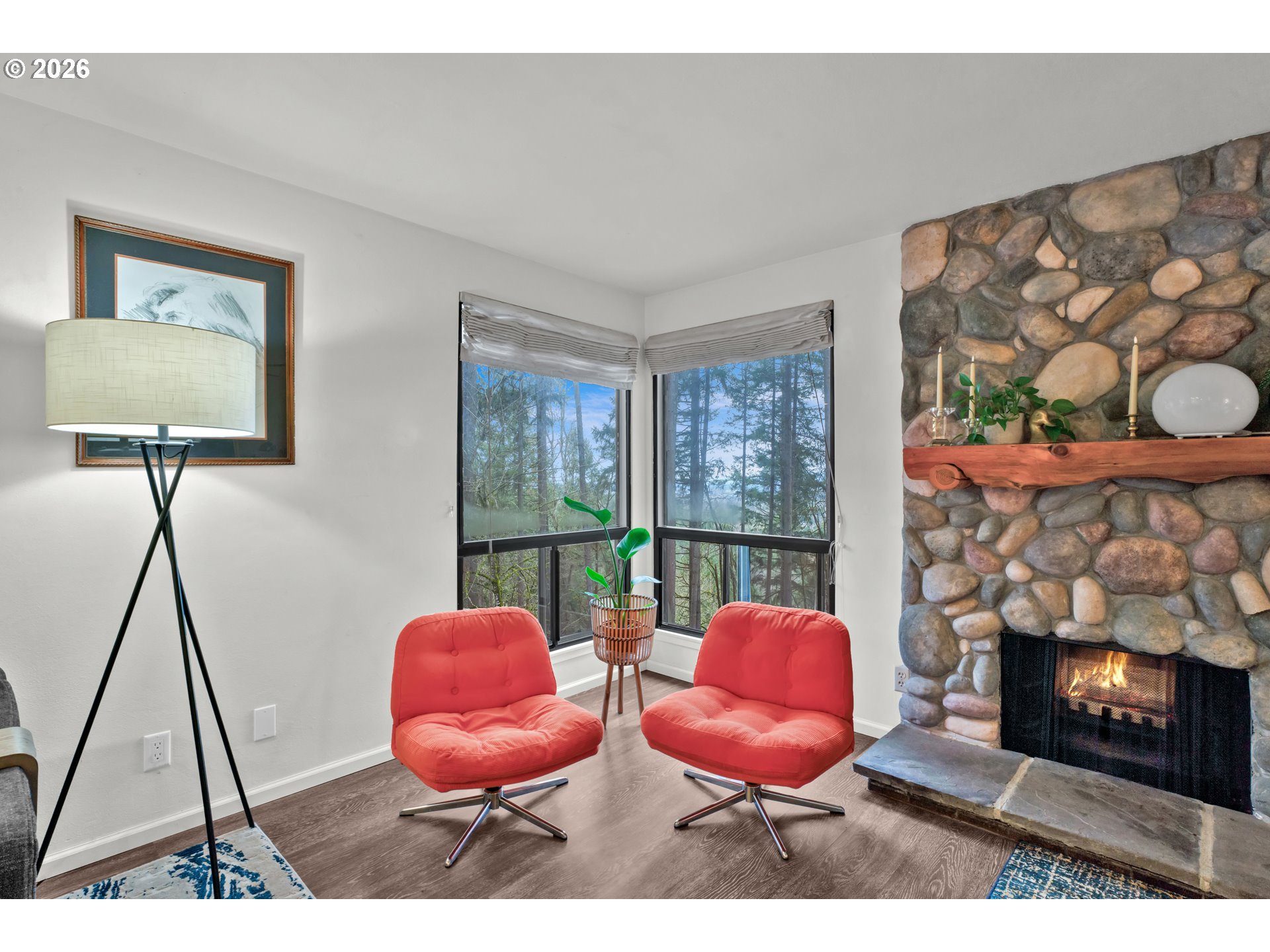 126 Treehill Loop Eugene, OR 97405 - Photo 4 of 35 a living room with furniture a rug and a fireplace