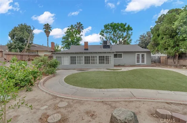 a house view with a garden space