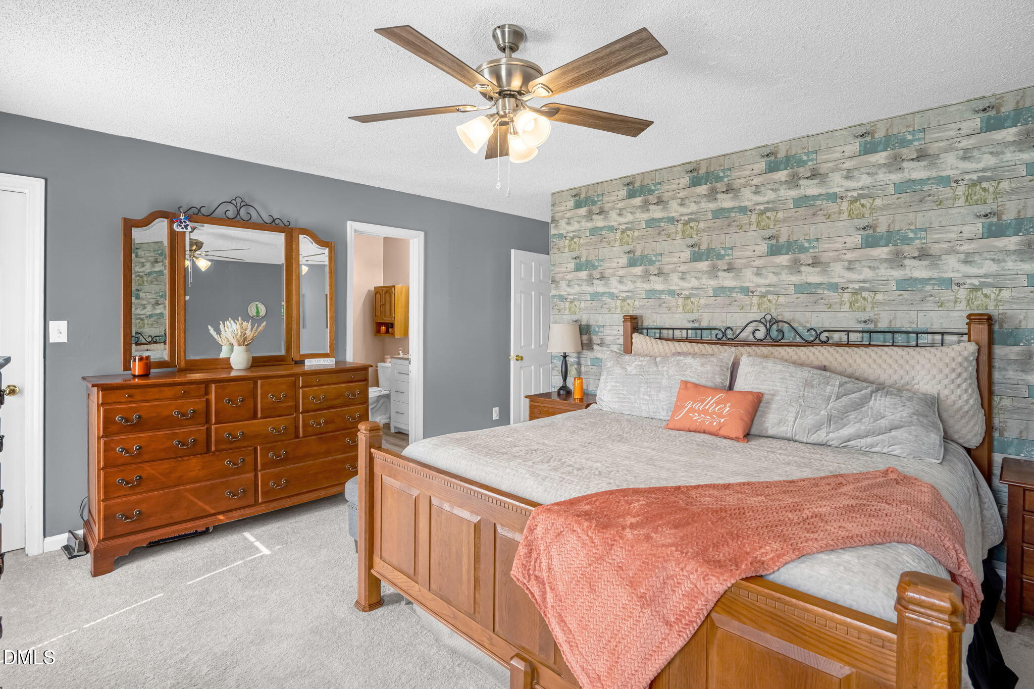 5626 Preston Loop Mebane, NC 27302 - Photo 19 of 33 a bed room with a bed and a dresser