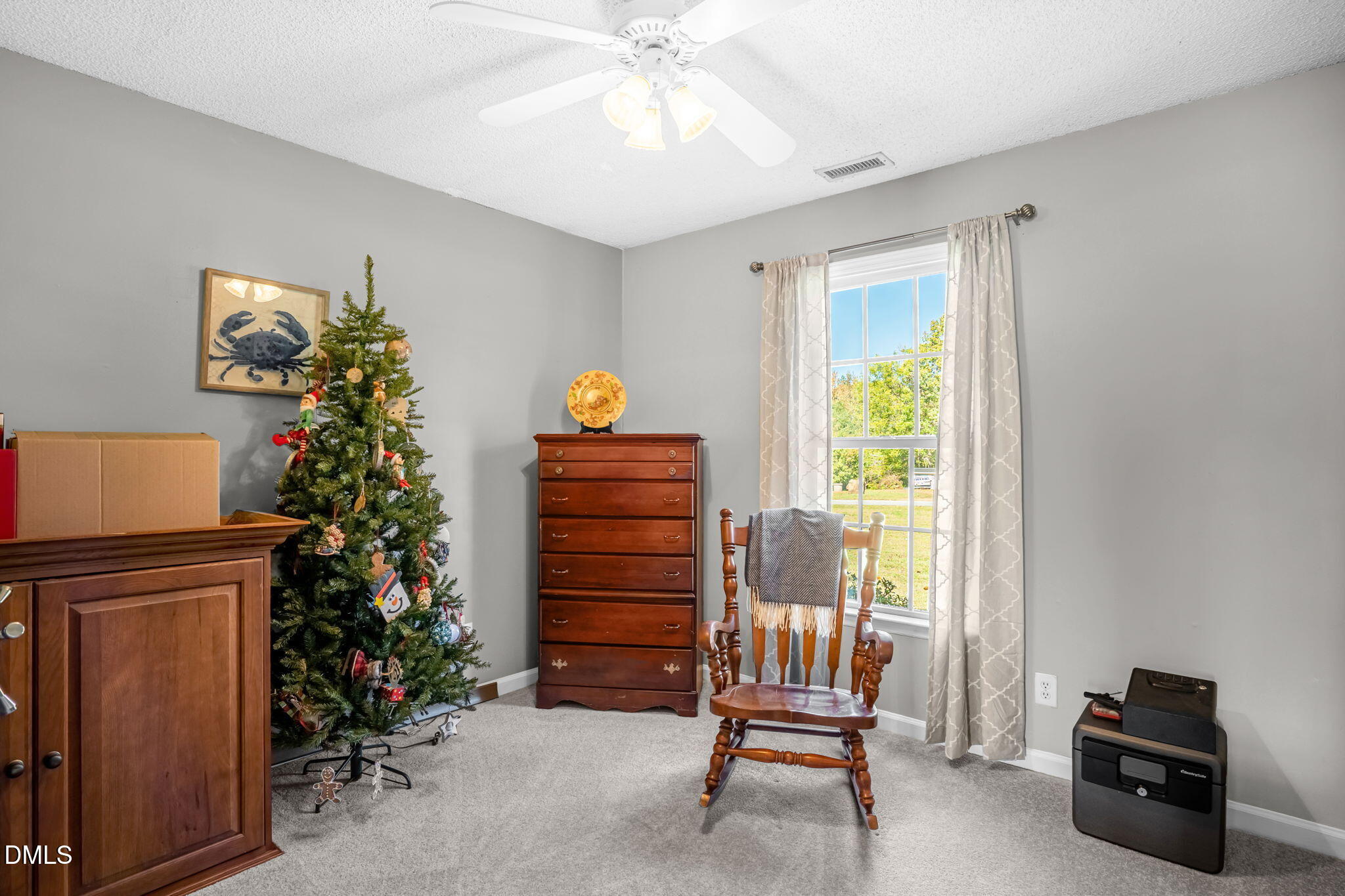 5626 Preston Loop Mebane, NC 27302 - Photo 21 of 33 a living room with furniture plant and a window