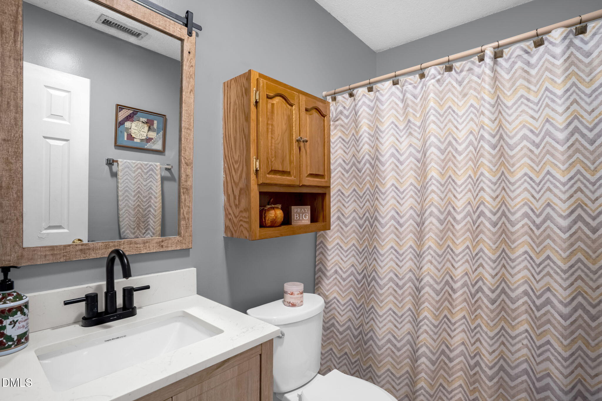 5626 Preston Loop Mebane, NC 27302 - Photo 22 of 33 a bathroom with a sink and a toilet