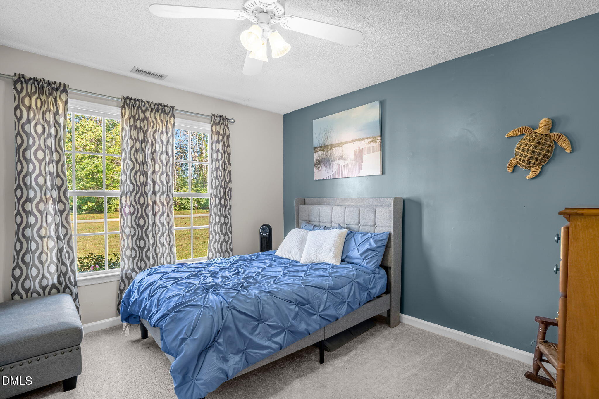 5626 Preston Loop Mebane, NC 27302 - Photo 23 of 33 a bedroom with a bed and a couch