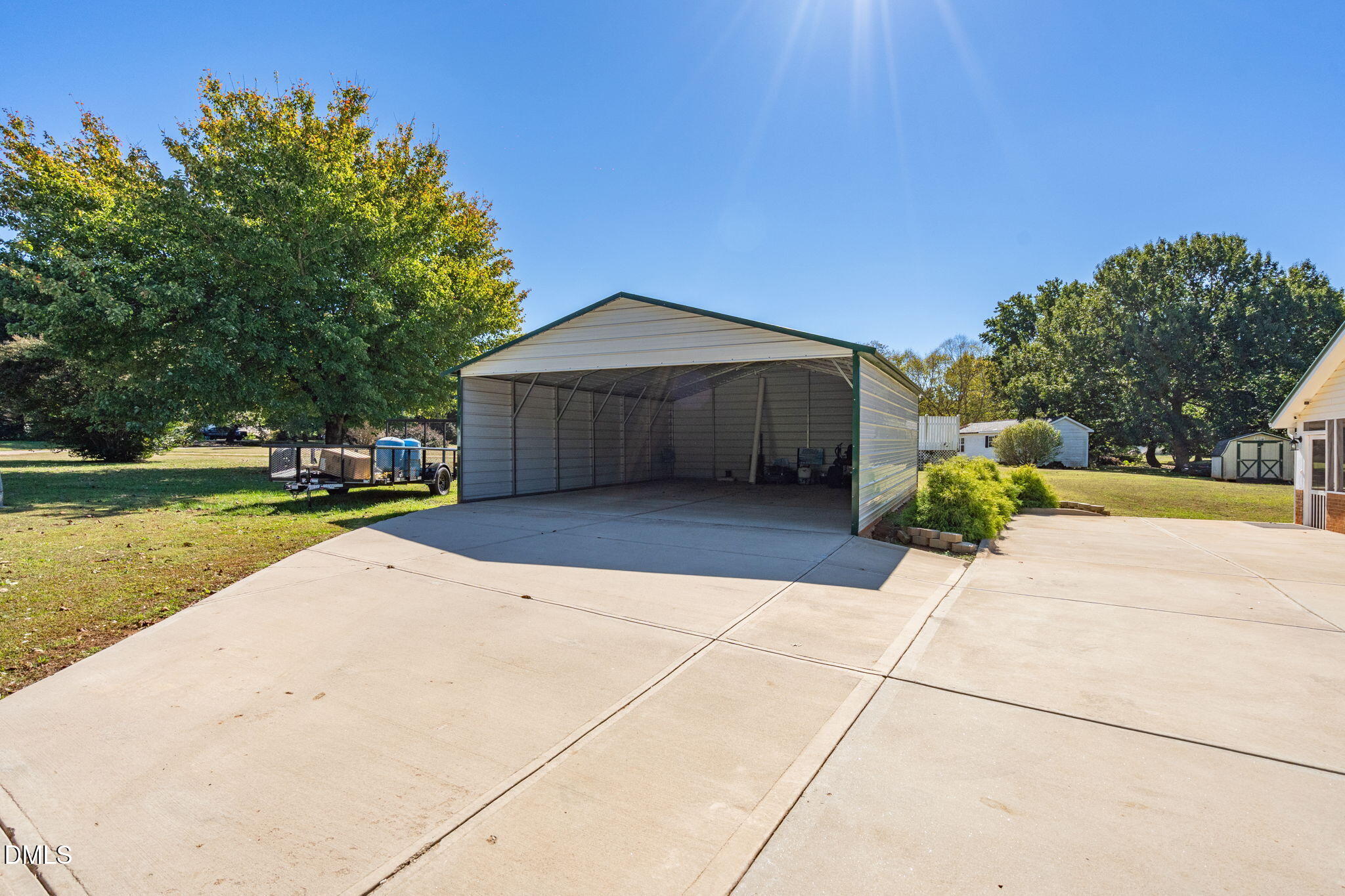 5626 Preston Loop Mebane, NC 27302 - Photo 27 of 33 a house with trees in the background