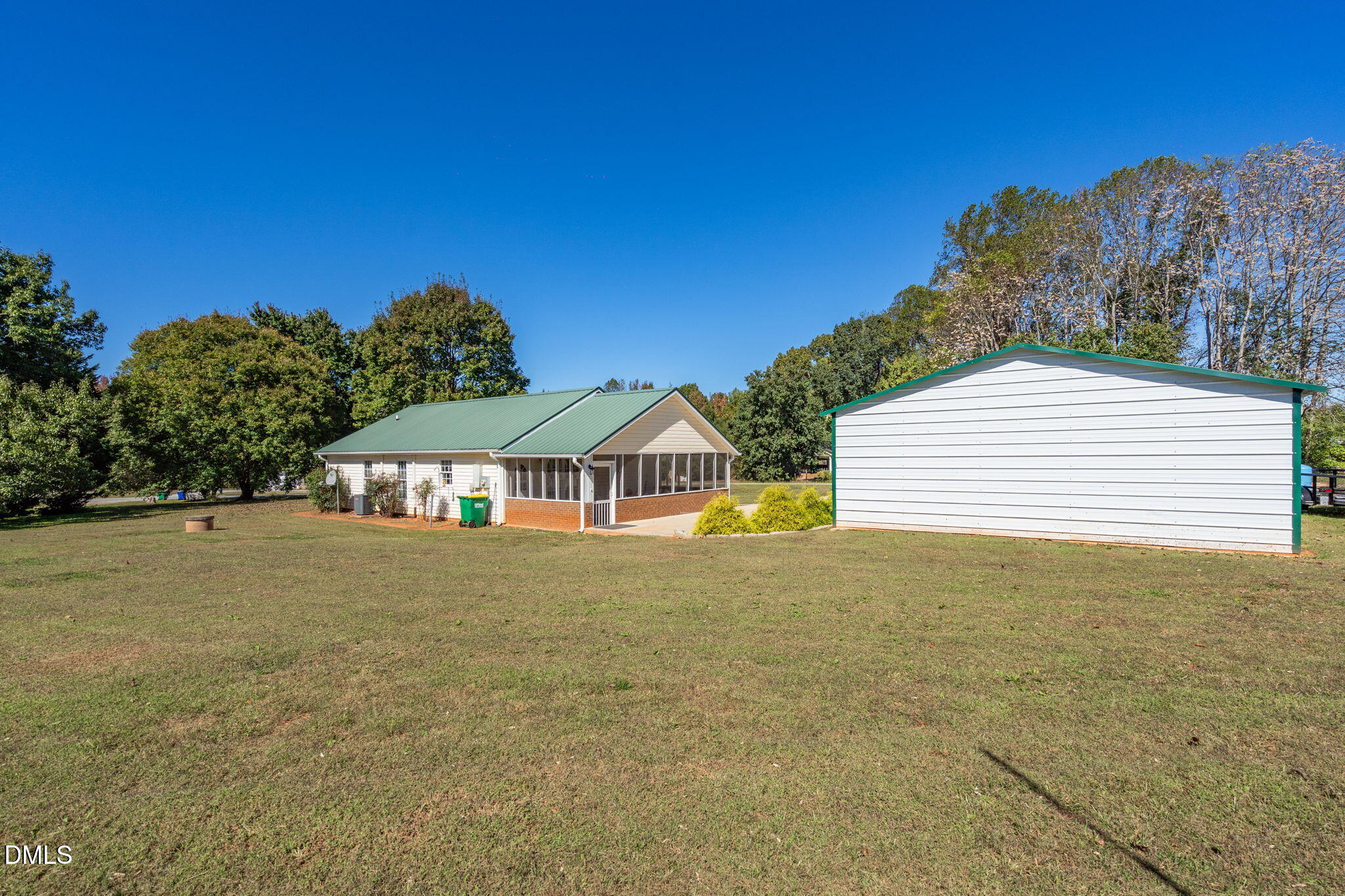 5626 Preston Loop Mebane, NC 27302 - Photo 28 of 33 a view of a house with a yard and garage
